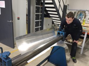Murphy Ransley Miles of the Parnall Aircraft Company rolling sheet metal for the Mk Vb Supermarine Spitfire 